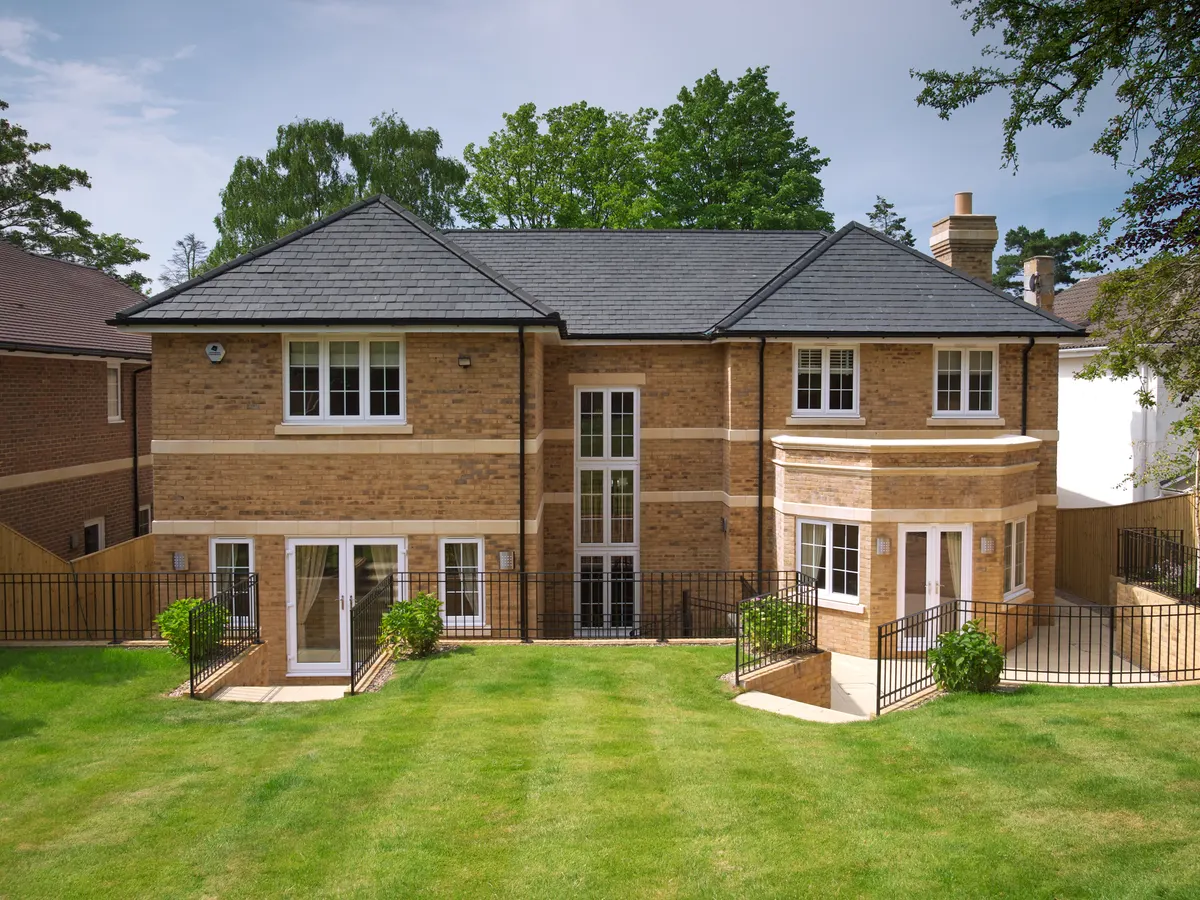 A large brick house with a finished tiled roof