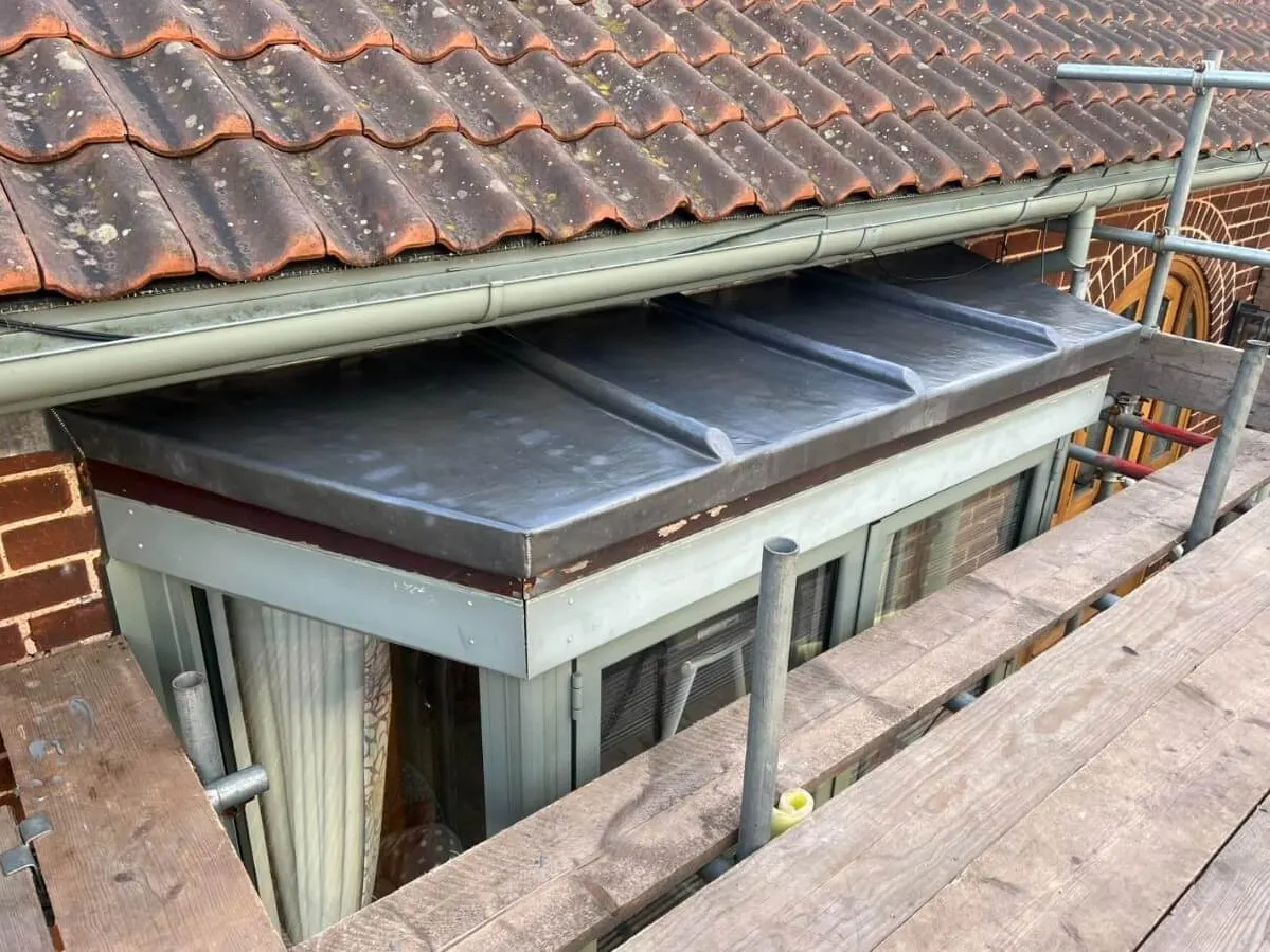 A flat roof over a ground floor extension