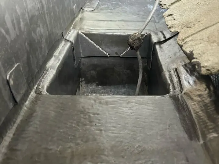 Lead lining dressed around a roof opening