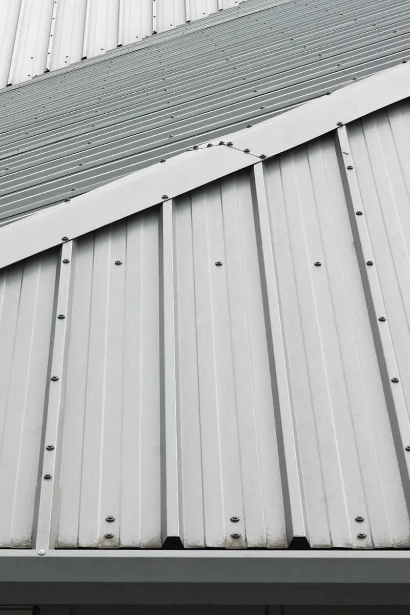 Metal roof sheets fixed along a commercial building