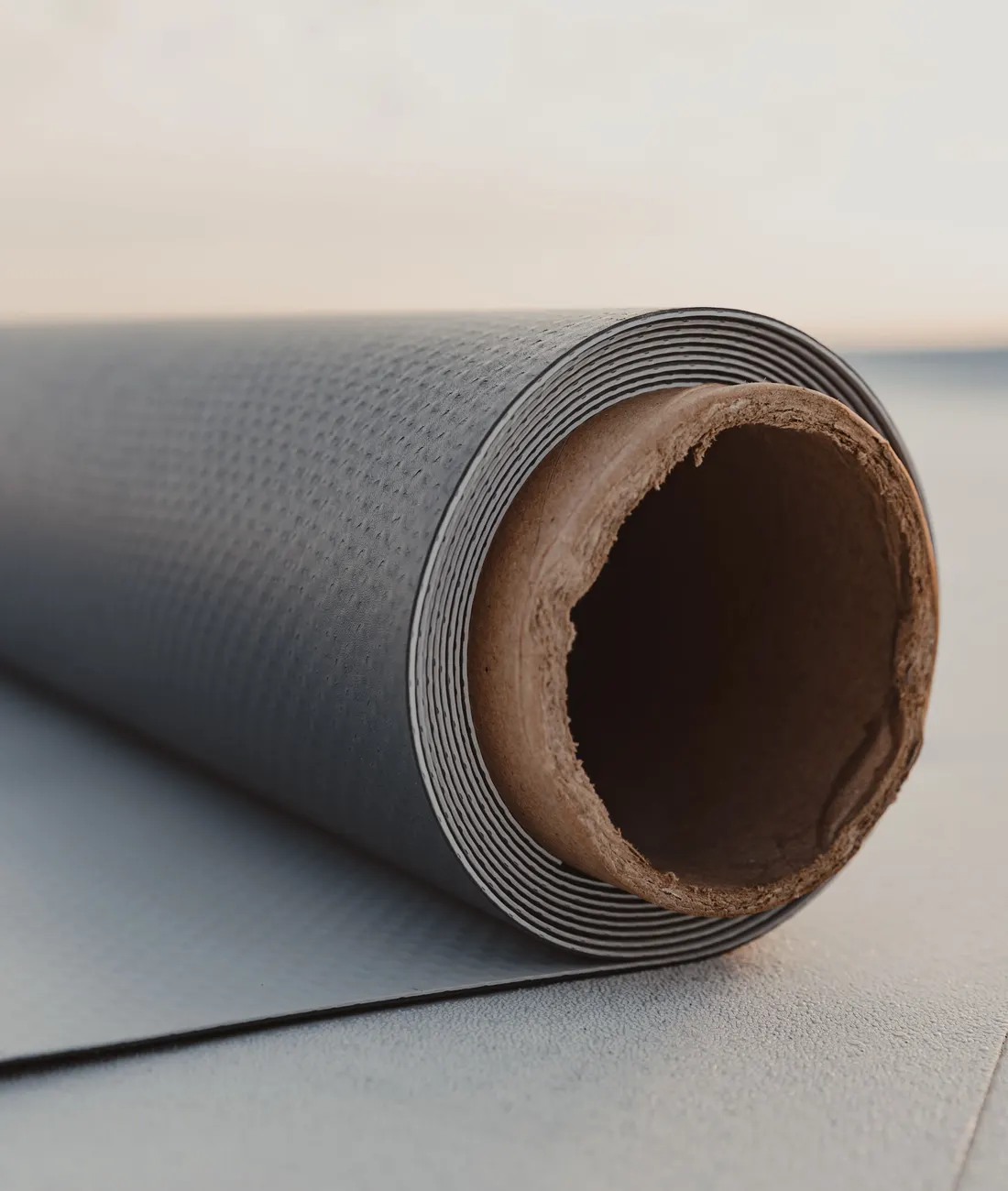 A roll of rubber roofing membrane