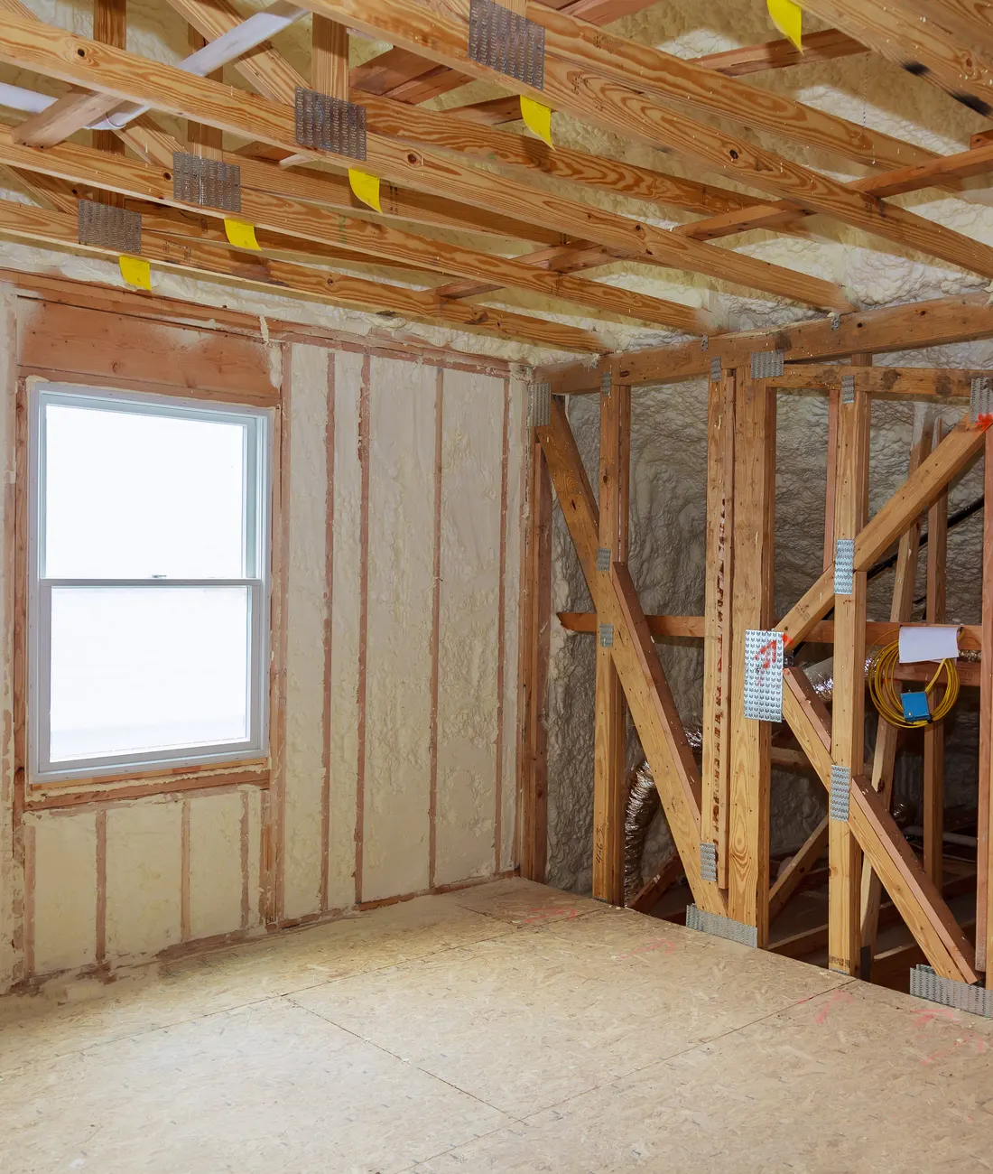 Spray foam on the roof and walls of a loft